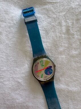 Swatch Blue Strap Watch with Multicolor Playful Dial